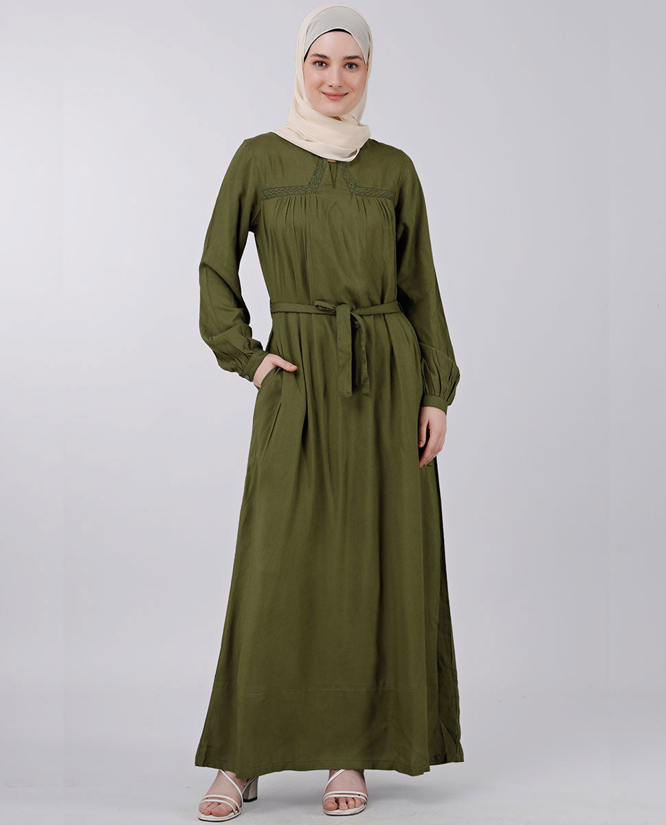 Front view of moss green belted abaya – modest abaya design
