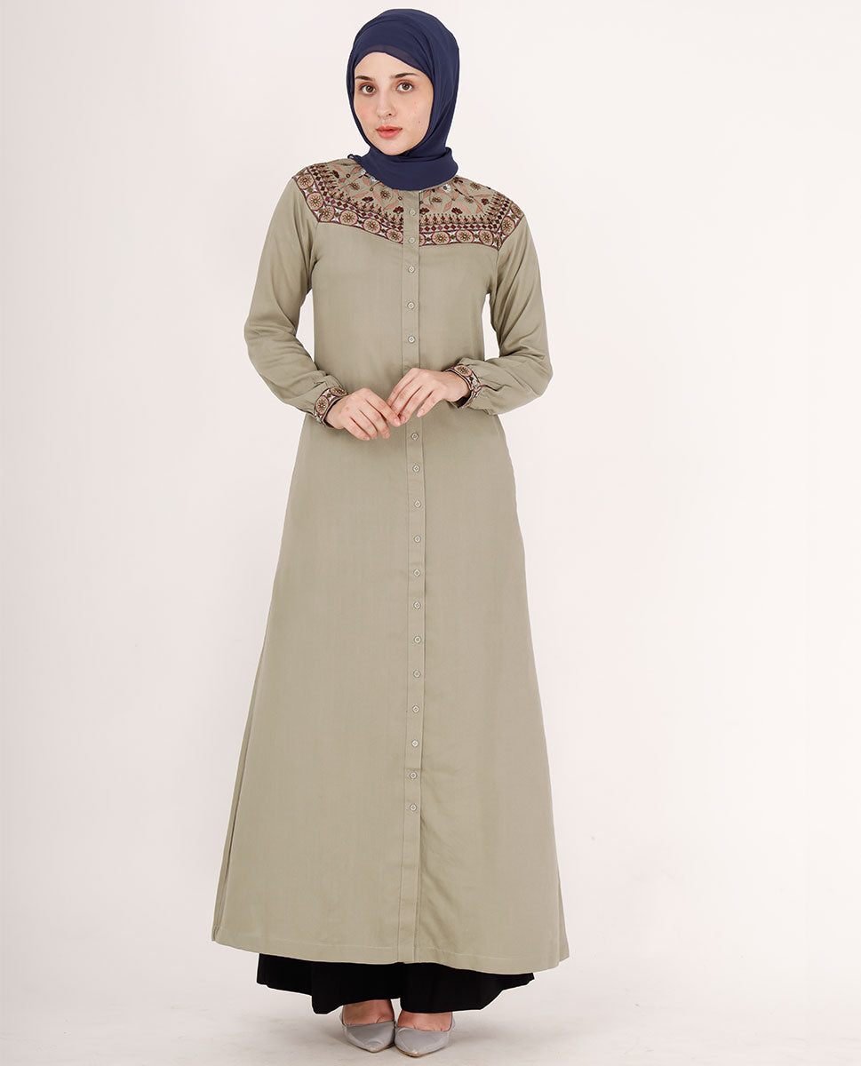 Front view of mint green embroidered abaya – modest abaya design