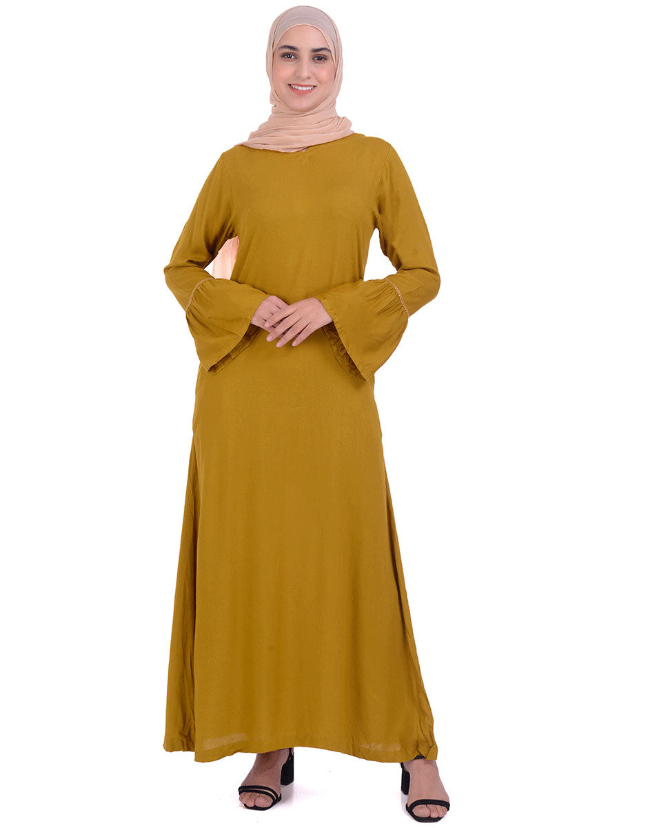 Front view of mustard with back embroidery abaya – modest abaya design