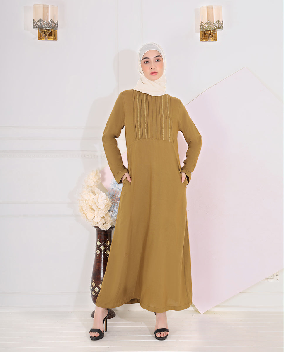 Front view of olive green pintuck abaya – modest abaya design