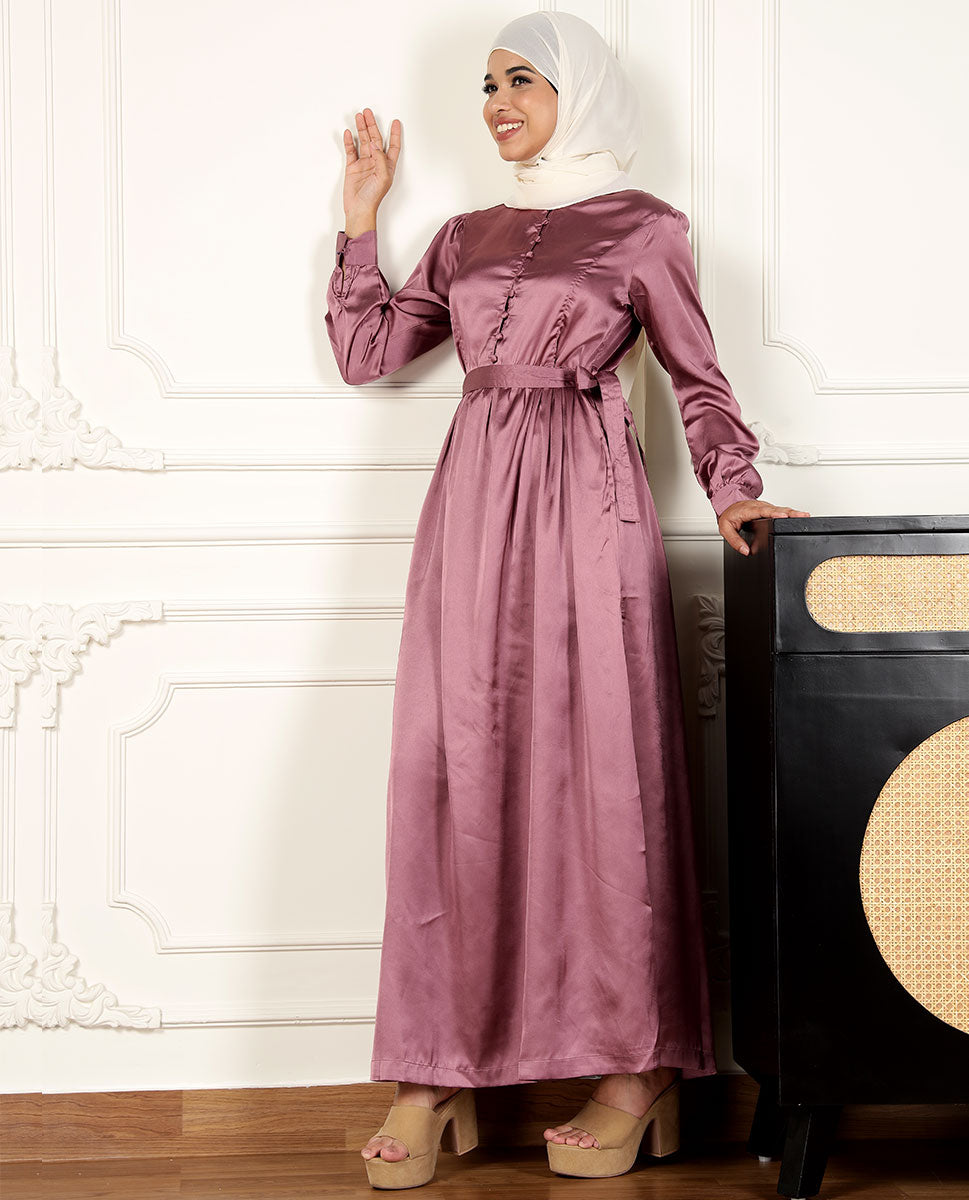 Front view of peach blossom flared satin maxi dress – modest abaya design